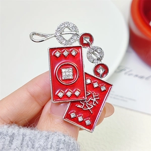 Festive Chinese New Year red envelope brooch with crystal embellishments for suits