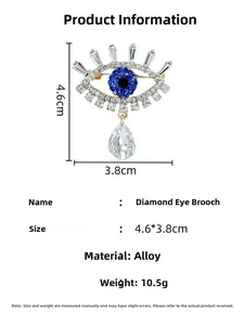 Detail view of Evil Eye brooch dimensions 4.6cm by 3.8cm with blue rhinestones
