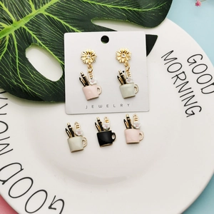 DIY flower stationery jewelry charms set with miniature pen cup and sunflower detail
