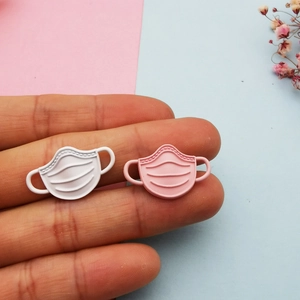 DIY matte alloy mask charms in pink and white for earrings and jewelry making