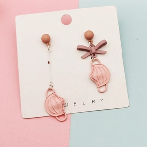 Creative matte finish asymmetric bow and medical mask drop earrings for DIY jewelry