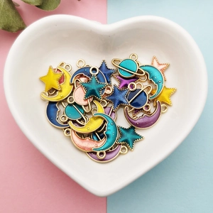 DIY enamel star and moon alloy charms for handmade jewelry making in heart-shaped bowl