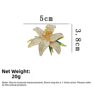 Detailed view of lily flower brooch dimensions: 5cm width, 3.8cm height and 20g weight