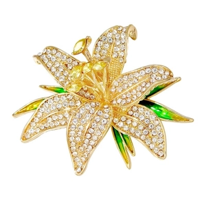 Luxurious gold lily flower brooch with white diamonds and green enamel petals