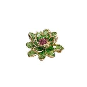 Elegant green enamel lotus brooch with gold alloy base and sparkling purple rhinestone