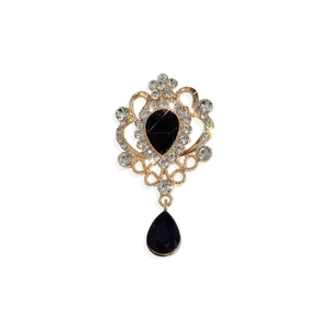 Vintage gold brooch with black pear-shaped crystal and shimmering white rhinestones