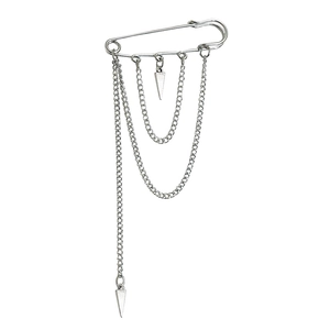 Detail of silver safety pin brooch with triple chain layers and triangle charms