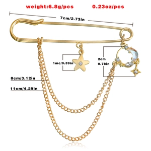 Detail showing dimensions and weight of the gold star moon tassel safety pin brooch