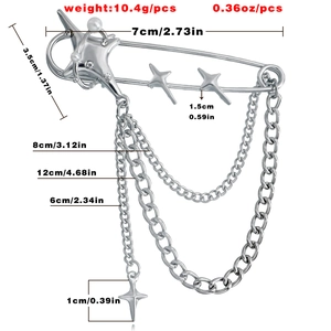 Macro detail of silver star brooch with layered metal chains, pearls and size dimensions