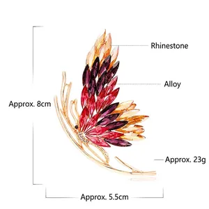 Broche papillon élégante en cristal dégradé et alliage doré, dimensions 8cm x 5,5cm
