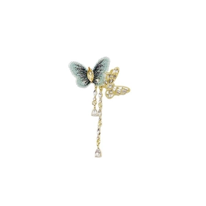 Vintage Stoff Schmetterling Brosche mit Quastenketten und Strass auf weißem Grund