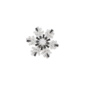 Luxurious rotating snowflake brooch with silver finish, black gems and white zircon crystals