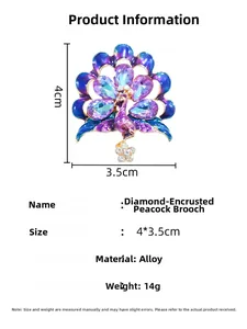 Detail view of rhinestone peacock brooch with blue enamel finish and dimensions 4x3.5cm
