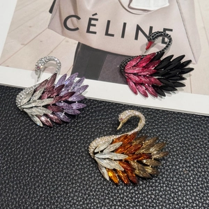Elegant crystal swan brooches set with gradient rhinestones in three stylish colors