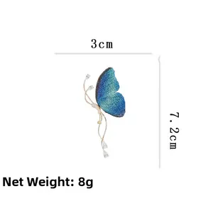 Tableau détaillé des tailles pour broche papillon bleue avec mesures précises