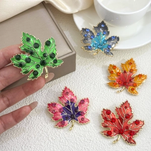 Elegant maple leaf brooches with gradient enamel and crystals in five colors set on silk