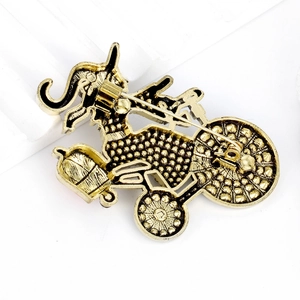 Halloween witch riding bicycle pumpkin brooch with golden metal pins back view details