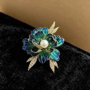 Vintage enamel peony brooch with blue petals, a large white pearl and crystal accents