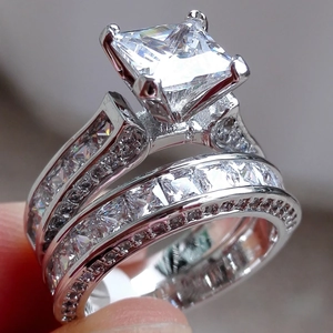 Silver tone princess cut zircon ring set for couples featuring shimmering silver plating