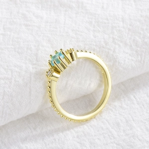 18k gold plated S925 silver ring with light blue square gemstone and side diamonds