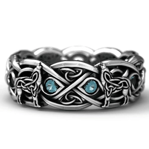 Anillo de tótem de lobo retro con texturas celtas y piedras azules en plata