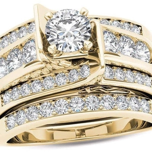 Set di anelli di coppia in oro con grande zircone rotondo e diamanti micro-pavé
