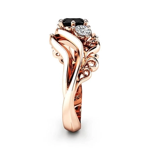 Roségouden ring met ronde zwarte obsidiaan en verfijnd filigraan vintage ontwerp