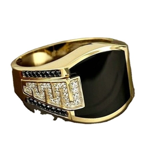 Men's gold-plated ring featuring black enamel inlay and side-set pavé zircon accents