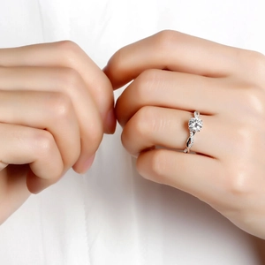 Elegant twist band sparkling diamond engagement ring on finger for women jewelry