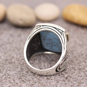 Vintage silver eagle ring for men featuring an eagle design and square blue stone