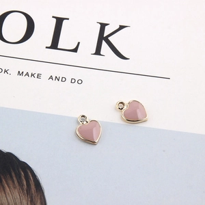 DIY gold heart pendants with pink enamel finish for jewelry making bracelets and necklaces