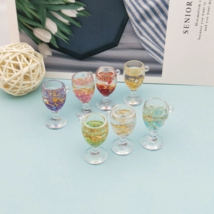 Set of seven colorful acrylic wine glass charms with gold foil and sequins for DIY jewelry