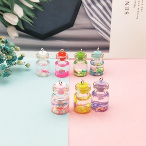 Set di 7 mini ciondoli a bottiglia dei desideri colorati per gioielli fai da te