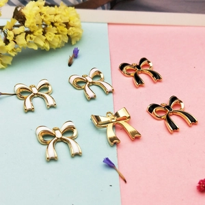 Pendentifs nœuds DIY en émail noir et blanc avec cadre en alliage doré pour bijoux