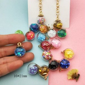 Colorful 16x21mm star-filled glass ball charms with metal loops for jewelry making