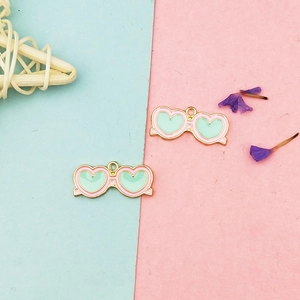 Pink heart-shaped eyewear charms with mint green enamel inlay for DIY jewelry making