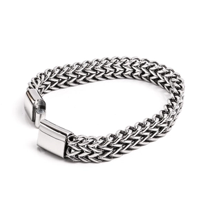 Close-up of double-row wheat chain texture and square clasp on men's steel bracelet