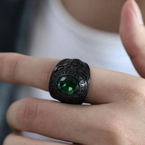 Macro detail of United States Army ring featuring dark green stone and eagle relief