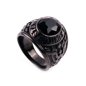 Detail of vintage army ring with United States eagle relief and black faceted stone