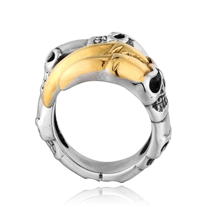 Gothic punk titanium steel ring featuring carved skulls and a gold feather accent detail
