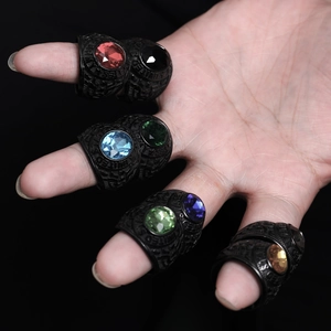 Detail of vintage military-style rings with colorful gemstones and United States relief