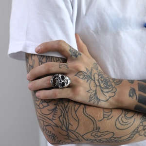 Vintage stainless steel skull ring for men with antique silver finish and punk style