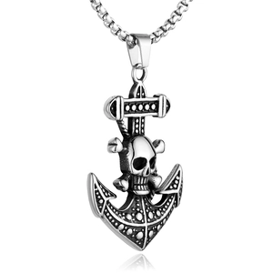 Macro detail of vintage punk anchor skull pendant with a silver-finish box chain