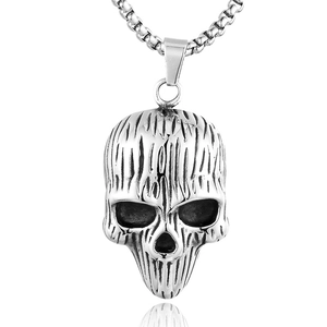 Vintage silver skull pendant with vertical stripes and steel chain for punk style