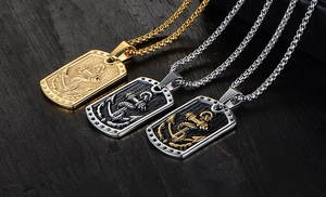 Three men's anchor and dumbbell stainless steel square pendants on dark wood background