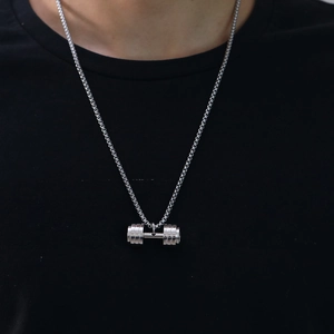 Fashion fitness dumbbell pendant necklace in stainless steel worn by male model
