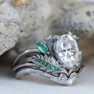 Vintage zilveren kroonringset met peervormige steen en groene accenten