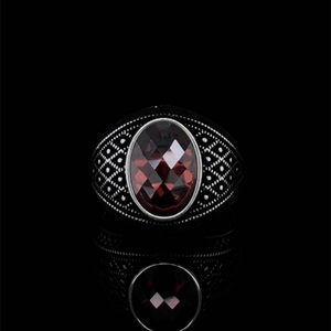 Retro men's silver alloy ring featuring an oval faceted red ruby with textured band