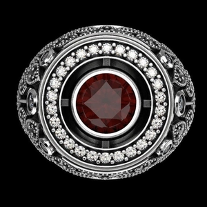 Bague vintage en argent avec un grand rubis rouge rond et diamants blancs micro-pavé