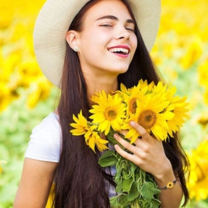 Outdoor shot of friendship card bracelet set with sunflower stud earrings and woven cord